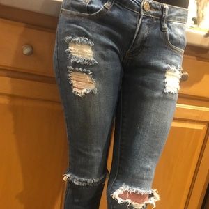 Distressed Medium Wash Skinny Jeans